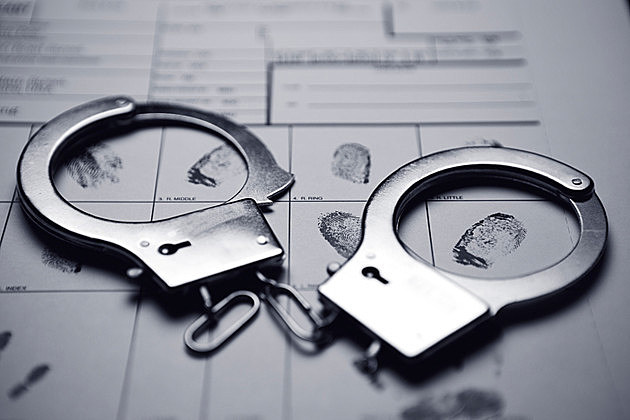 Handcuffs And Fingerprints