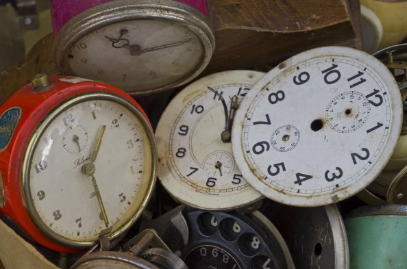 Old alarm clocks are offered for sale at the weekly flea